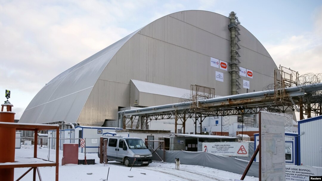 A general view shows the "New Safe Confinement" structure over the old sarcophagus covering the damaged fourth reactor at the Chernobyl nuclear power plant in Chernobyl, Ukraine, Nov. 29, 2016.