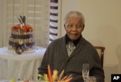 Former South African President Nelson Mandela as he celebrates his birthday with family in Qunu, South Africa, July 18, 2012.