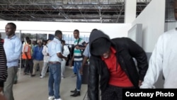 Somali nationals deported from the US arrive in Mogadishu. (Somali National News Agency -- SONNA)
