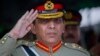 FILE - Pakistani Army Chief General Ashfaq Kayani salutes during a ceremony in Quetta on October 11, 2011.