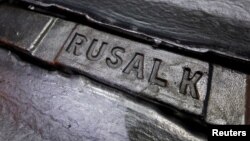 FILE - Aluminum ingots are seen stored at the foundry shop of the Rusal Krasnoyarsk aluminum smelter in the Siberian city of Krasnoyarsk, Russia.