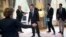 French President Francois Hollande (C) arrives to attend a meeting with young people ahead of a European Union leaders conference to discuss ways of tackling youth unemployment at the Elysee palace in Paris, Nov. 12, 2013. 