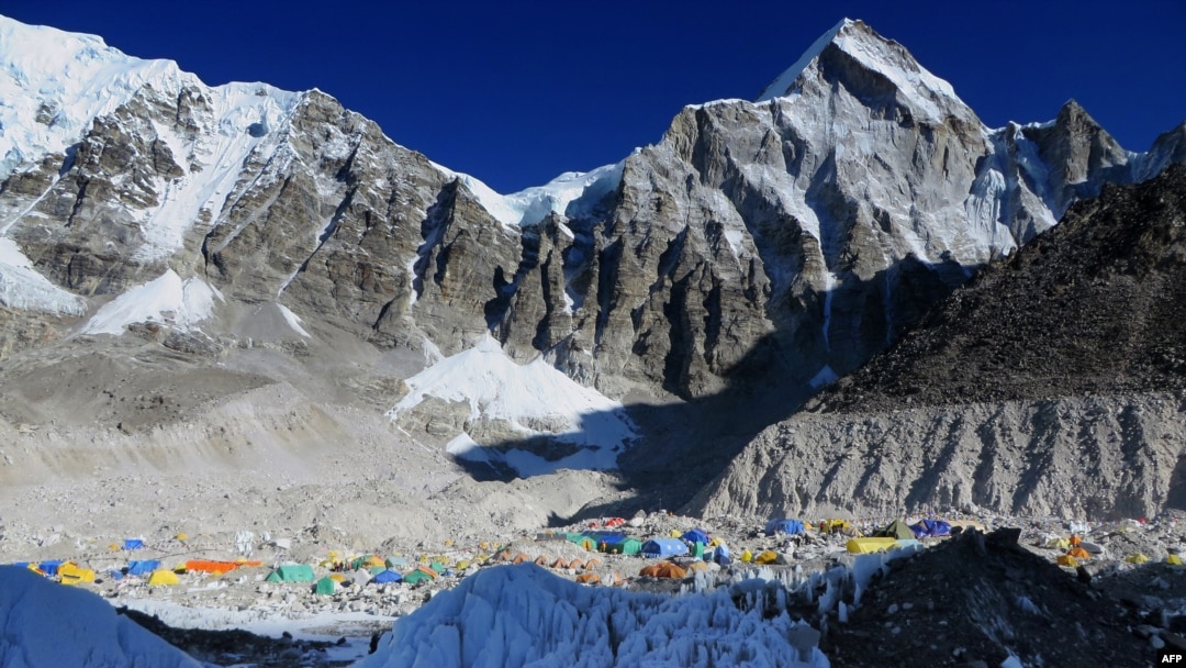 This photograph taken on April 18, 2014, shows Everest Base Camp from Crampon Point, the entrance into the Khumbu icefall below Mount Everest, following an avalanche that killed sixteen Nepalese sherpas in the Khumbu icefall.