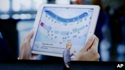 Apple CEO Tim Cook discusses the new iPad during the Apple event at the Bill Graham Civic Auditorium in San Francisco, California.