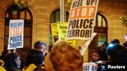 FILE - Protestors gather outside of the courthouse on the first day of jury selection for Baltimore Police Officer William Porter who is charged in connection with the death of Freddie Gray, in Baltimore, Md., Nov. 30, 2015.