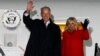 US Vice President Joe Biden (L) and his wife Jill wave upon their arrival at Boryspil International airport outside Kyiv November 20, 2014.