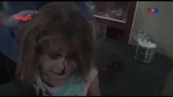 Bé gái Syria khóc lóc tìm cha