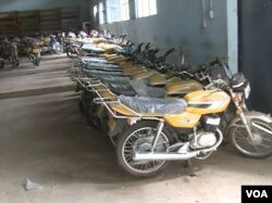 Motorcycles given to vigilantes are kept in Mora since the war has abated. (M.E. Kindzeka/VOA)