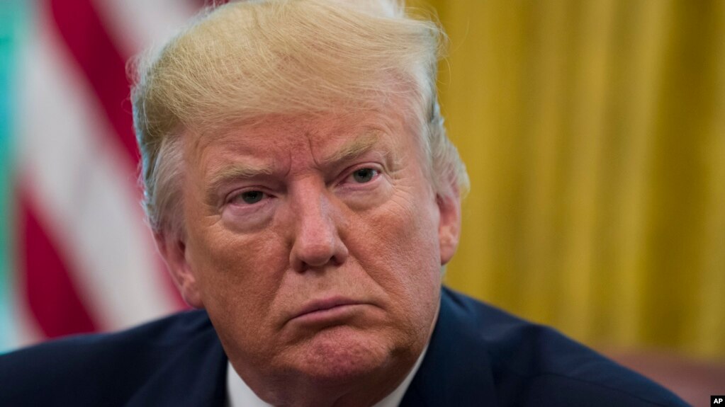 Trump. President Donald Trump listens as he receives an an update on the Fentanyl epidemic, in the Oval Office of the White House in Washington, Tuesday, June 25, 2019. (AP Photo