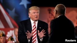 Republican presidential nominee Donald Trump speaks to Matt Lauer during the Commander in Chief Forum in Manhattan, New York, Sept. 7, 2016. 