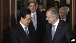 China's President Hu Jintao meets with Senate Majority Leader Harry Reid of Nev. on Capitol Hill in Washington, Thursday, Jan. 20, 2011. Senate Foreign Relations Committee Chairman Sen. John Kerry, D-Mass. is second from left, the committee's ranking Repu