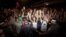 Israeli activists raise their hands during a social protest in Tel Aviv, June 24, 2012.