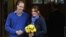 Britain's Prince William leaves the King Edward VII hospital with his wife Catherine, Duchess of Cambridge, in London December 6, 2012. 