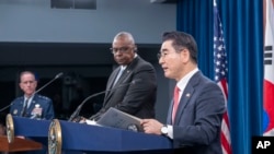 Defense Secretary Lloyd Austin, center, listens as South Korean Defense Minister Kim Yong Hyun, right, speaks during a joint press briefing at the Pentagon on Oct. 30, 2024 in Washington. At left is Pentagon Press Secretary Maj. Gen. Pat Ryder.