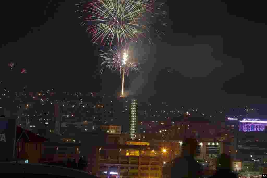 Fireworks illuminate the sky over the capital of Kosovo, Pristina, celebrating the 5th anniversary since Kosovo seceded from Serbia.