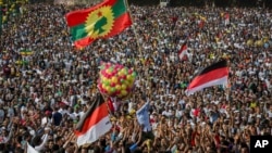 Ethiopians rally in solidarity with Prime Minister Abiy Ahmed in Meskel Square in the capital, Addis Ababa, Ethiopia, June 23, 2018. A deadly explosion struck the huge rally for Ethiopia's reformist new prime minister on Saturday shortly after he spoke.