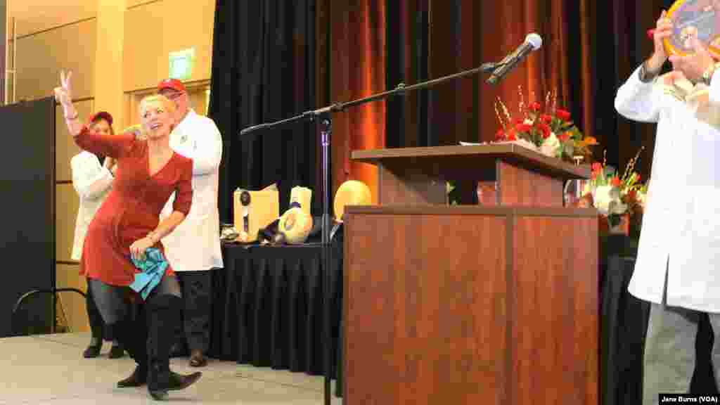 Marieke Penterman of Marieke Gouda does her happy dance that has become a familiar sight at cheese contests. At the U.S. Cheese Championship, her cheeses were ranked No. 2 and No. 3 cheeses among the 2,555, in Green Bay, Wis., March 7 2019.