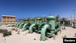 FILE - Pipelines are seen at the Zueitina oil terminal in Zueitina, west of Benghazi, April 7, 2014. 