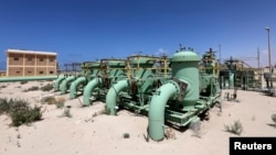 FILE - Pipelines are seen at the Zueitina oil terminal in Zueitina, west of Benghazi, Libya.