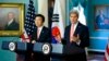 U.S. Secretary of State John Kerry (R) and South Korea's Foreign Minister Yun Byung-se talk to reporters about the 2+2 Ministerial meetings, at the State Department in Washington, Oct. 24, 2014.