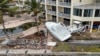 Boats sit after being pushed ashore by floodwaters from Hurricane Helene, Sept. 28, 2024, in St. Petersburg, Florida.