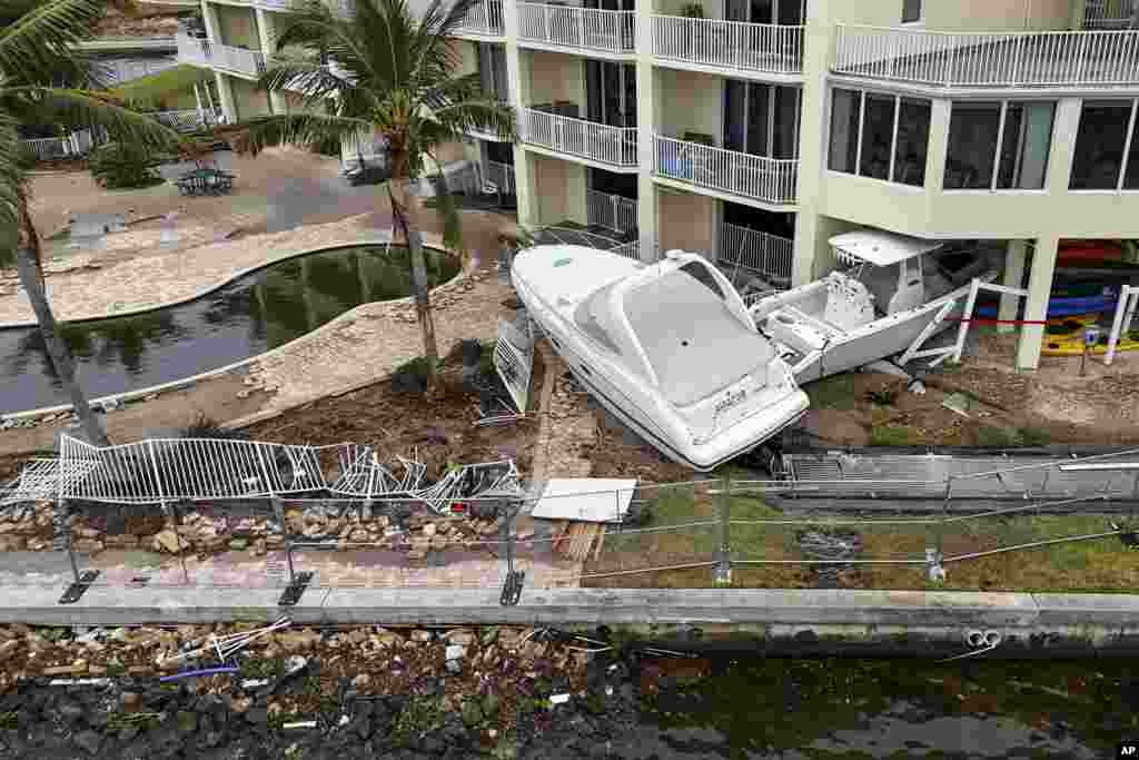 Boats sit after being pushed ashore by floodwaters from Hurricane Helene, Sept. 28, 2024, in St. Petersburg, Florida.