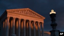 FILE - The Supreme Court is seen at sunset in Washington.