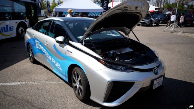 A 2021 Toyota Prius that runs on a hydrogen fuel cell sits on display at the Denver auto show Friday, Sept. 17, 2021, at Elitch's Gardens in downtown Denver. (AP Photo/David Zalubowski)