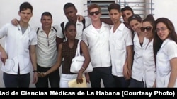 Juan Carlos Dominguez Lopez, second from left, and medical students at Universidad de Ciencias Médicas de La Habana.