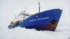 Antártica: rescate de barco por helicóptero