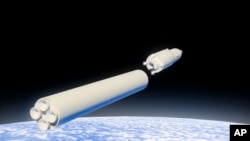 FILE - In this video grab provided by RU-RTR Russian television via AP television on March 1, 2018, a computer simulation shows a Russian Avangard hypersonic vehicle being released from booster rockets.