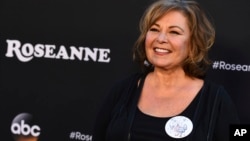 Roseanne Barr arrives at the Los Angeles premiere of "Roseanne" on Friday, March 23, 2018 in Burbank, Calif. (Photo by Jordan Strauss/Invision/AP)