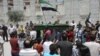 Anti-government protesters carry the body of Yaser Raqieh, whom protesters say was killed by forces loyal to Syria's President Bashar al-Assad, near Hama June 5, 2012. 