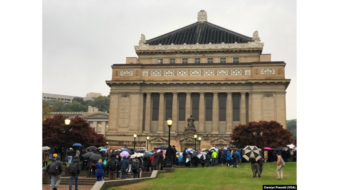 Thousands attended Sunday evening’s interfaith vigil for the shooting victims at the Soldiers and Sailors Memorial near the Tree of Life synagogue.