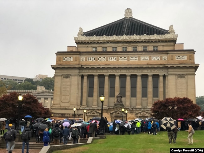 Thousands attended Sunday evening’s interfaith vigil for the shooting victims at the Soldiers and Sailors Memorial near the Tree of Life synagogue.