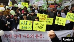 Protesters rally for North Korean defectors near the Chinese embassy in Seoul, March 3, 2012.