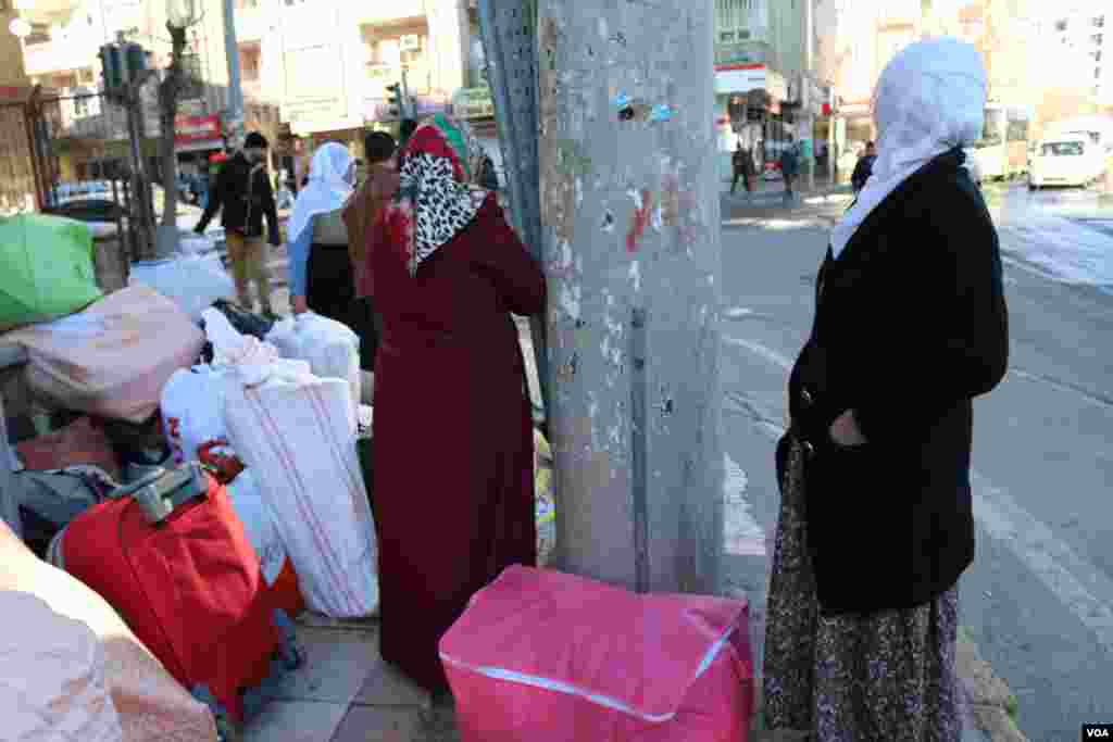 Residents living Sur district in Diyarbakir after the curfew was expanded