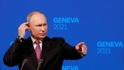 Switzerland, Geneva, Russia's President Vladimir Putin gestures as he holds a news conference after the U.S.-Russia summit with U.S. President Joe Biden