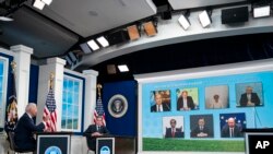 President Joe Biden adresses participants of the Major Economies Forum on Energy and Climate, in the South Court Auditorium on the White House campus, in Washington, Sept. 17, 2021, as Secretary of State Antony Blinken listens. 