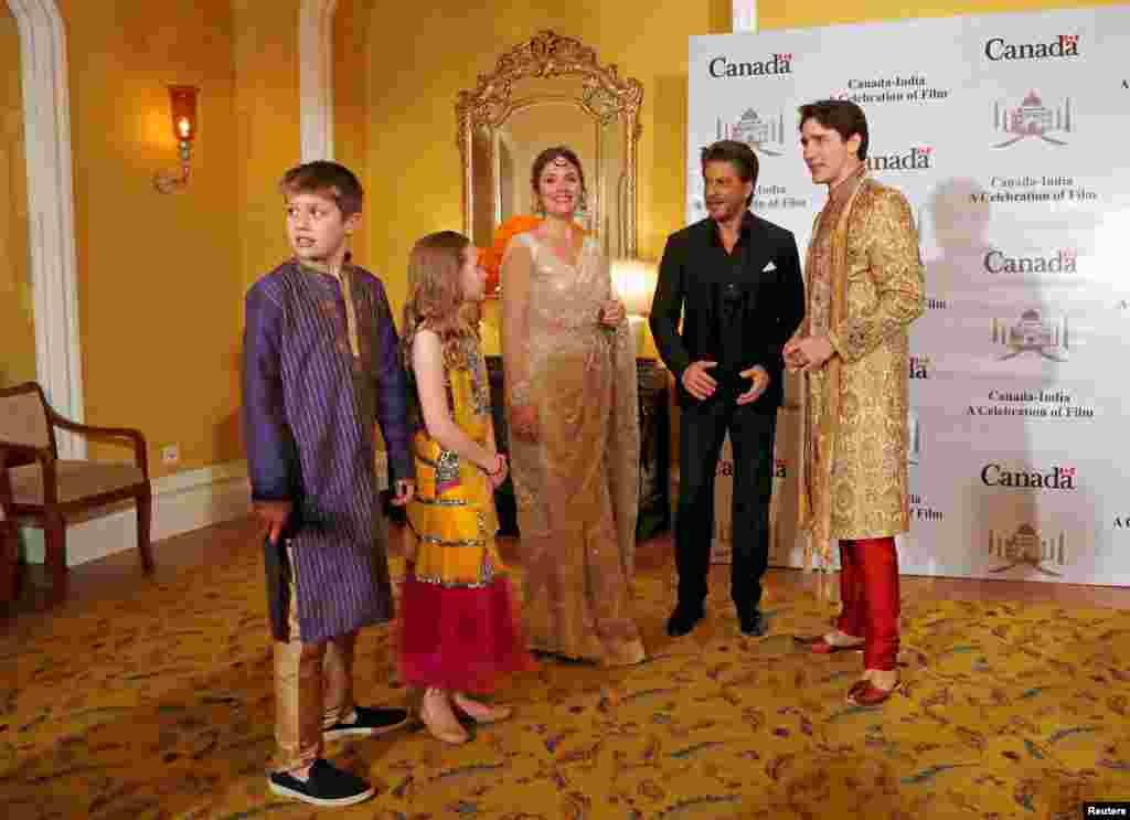 Canadian Prime Minister Justin Trudeau, his wife Sophie Gregoire Trudeau, their daughter Ella Grace and son Xavier pose with Bollywood actor Shah Rukh Khan in Mumbai, India.