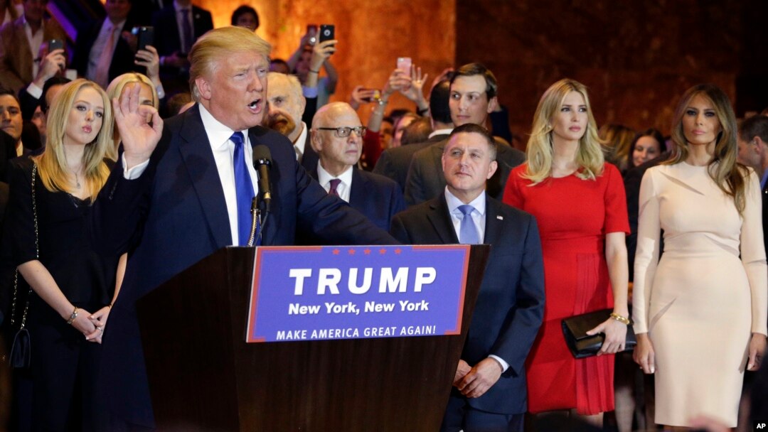 Surrounded by family and supporters, Republican presidential candidate Donald Trump speaks during a New York primary night campaign event, April 19, 2016, in New York. Trumps new campaign chief says the candidate has been "projecting an image" in order to energize voters in the primary election campaign. 