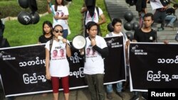 Thinzar Shun Lei Yi (L) speaks at a march for press freedom in Yangon, Myanmar, September 1, 2018.