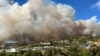 FILE - This photo taken by Pacific Palisades resident Darrin Hurwitz shows the Palisades fire as it approaches homes in Los Angeles, Jan. 7, 2025.