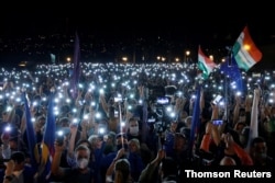 People take part in a protest for media freedom in Budapest, Hungary, July 24, 2020.