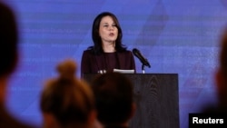 German Foreign Minister Annalena Baerbock speaks during a press conference in Beijing, China, Dec. 2, 2024.