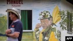 Un grafiti del líder de las FARC Manuel Marulanda se ve en el Área Territorial de Capacitación y Reincorporación (ETCR) El Oso, en Gaitania, Departamento de Tolima, Colombia, el 27 de octubre de 2021.