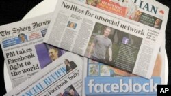 Diarios en Australia destacan historias sobre el bloqueo de noticias impuesto por Facebook en el país, el 19 de febrero de 2021, en Sydney.