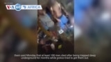 VOA60 Africa - At least 100 illegal miners died trapped in South African mine