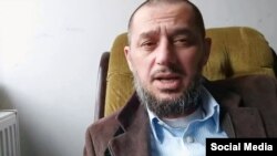 Chechen blogger Imran Aliyev is seen in a screengrab from YouTube video.