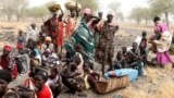 FILE - Women and children wait to be treated at a Medecins Sans Frontieres (MSF) support clinic in Thaker, Southern Unity, South Sudan, March 20, 2017. 